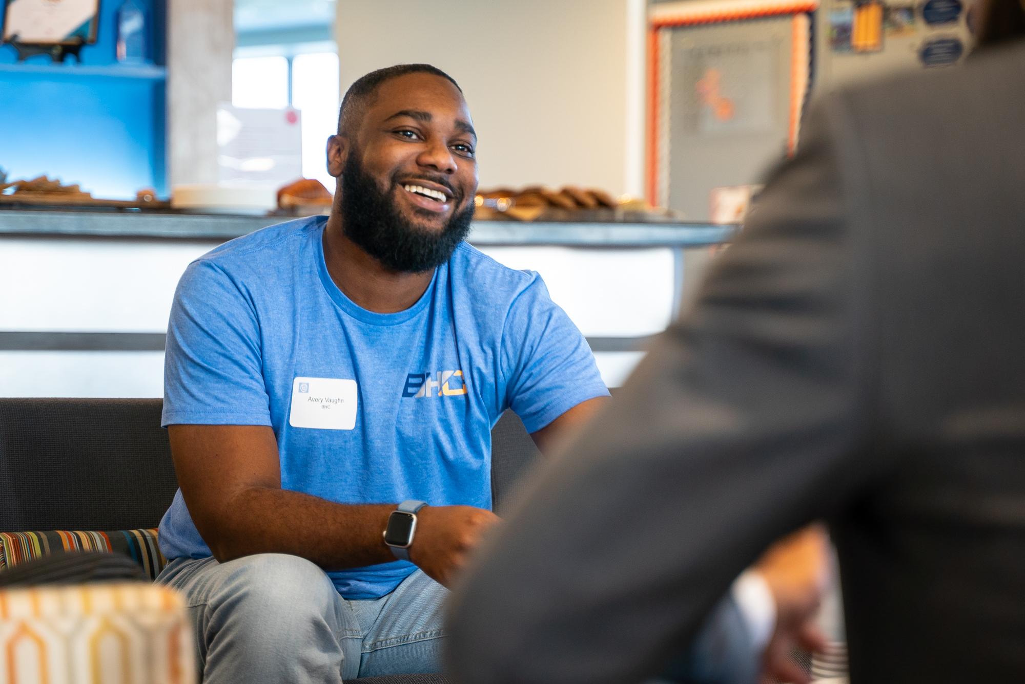 KCADC-6 candid photo of attendee smiling and talking